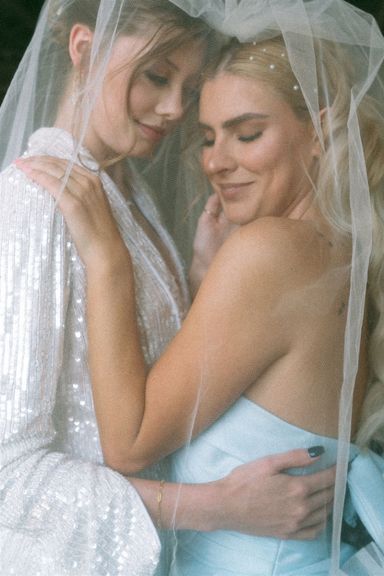 Brides embrace