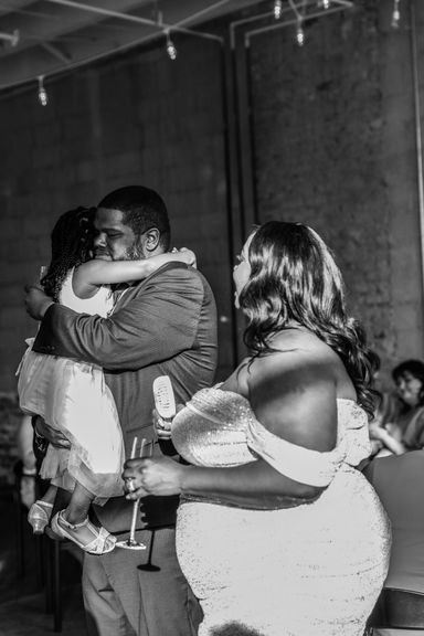 Groom and Daughter embrace