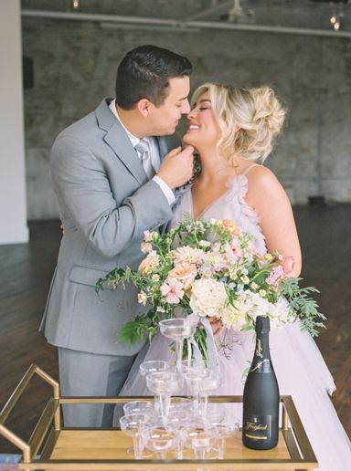 Bride & Groom share a kiss