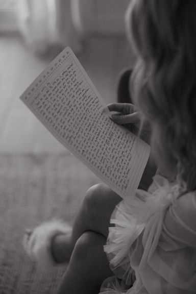 Bride reading a letter from her Groom