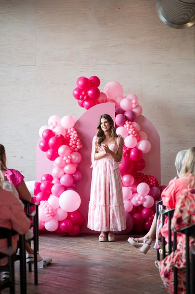 Woman speaking at a social event